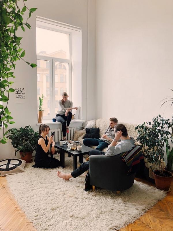 people-gathered-inside-house-sitting-on-sofa-1054974.jpg